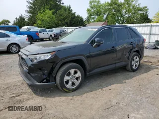 2019 Toyota RAV4 XLE with VIN JTMP1RFV8KJ001784, listed as a Copart auction lot 59109235 with 98,858 mi miles and Salvage title. Bid and sale history available at DreamBid. Image 1.