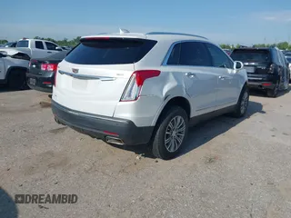 2018 Cadillac XT5 Luxury FWD with VIN 1GYKNCRS2JZ174756, listed as a IAAI auction lot 42192036 with 63,684 mi miles and . Bid and sale history available at carsss.com. Image 4.