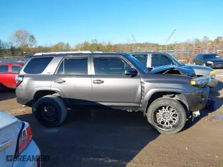 2015 Toyota 4Runner Limited with VIN JTEBU5JRXF5204738, listed as a IAAI auction lot 40918022 with 228,213 mi miles. Bid and sale history available at carsss.com. Image 13.