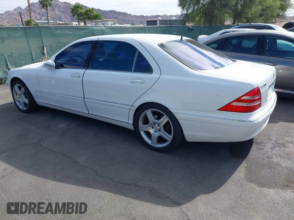 2002 Mercedes-Benz S 5.0L with VIN WDBNG75J92A261294, listed as a IAAI auction lot 42141509 with 116,532 mi miles. Bid and sale history available at carsss.com. Image 3.