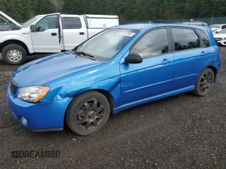2006 Kia Spectra with VIN KNAFE161565336270, listed as a Copart auction lot 48242945 with 166,977 mi miles and Salvage Title. Bid and sale history available at carsss.com. Image 1.