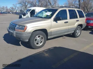 1999 Jeep Grand Cherokee Laredo with VIN 1J4GW58S4XC787702, listed as a IAAI auction lot 41663680 with 177,256 mi miles. Bid and sale history available at carsss.com. Image 2.