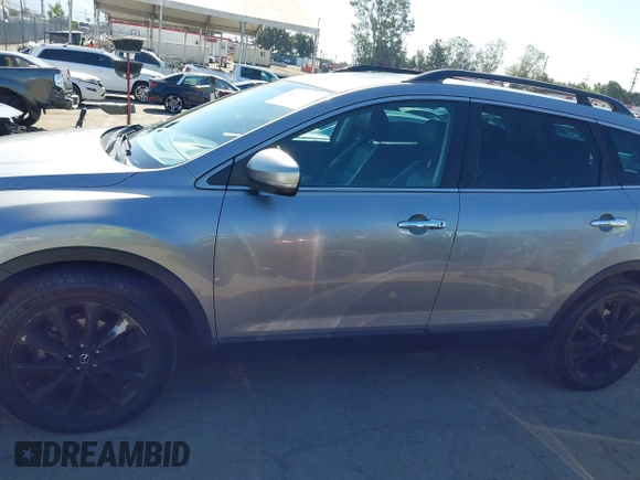 2014 Mazda CX-9 Grand Touring z VIN JM3TB3DV9E0437380, wystawiony jako IAAI lot #42298066 z przebiegiem 169 644 mil mil oraz . Historia ofert i sprzedaży dostępna na DreamBid. Obrazek 14.