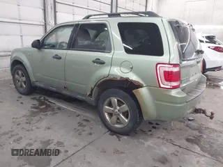 2008 Ford Escape XLT with VIN 1FMCU931X8KE68551, listed as a IAAI auction lot 41611972 with 267,034 mi miles. Bid and sale history available at carsss.com. Image 3.
