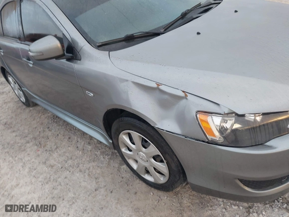 2015 Mitsubishi Lancer ES with VIN JA32U2FU5FU009375, listed as a IAAI auction lot 41933425 with 241,396 mi miles. Bid and sale history available at carsss.com. Image 6.