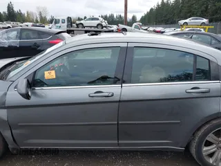 2011 Chrysler 200 Touring with VIN 1C3BC1FG2BN603732, listed as a IAAI auction lot 41938310 with 131,361 mi miles. Bid and sale history available at carsss.com. Image 14.