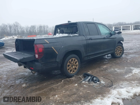 2021 Honda Ridgeline Sport with VIN 5FPYK3F12MB002877, listed as a IAAI auction lot 41576812 with 51,658 mi miles and . Bid and sale history available at DreamBid. Image 4.