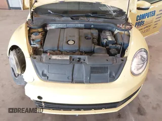 2012 Volkswagen Beetle 2.5L w/Sound/Nav PZEV with VIN 3VWJP7AT4CM613867, listed as a IAAI auction lot 41602806 with 167,004 mi miles. Bid and sale history available at carsss.com. Image 10.