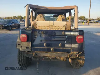 2000 Jeep Wrangler Sport with VIN 1J4FA49S0YP770943, listed as a Copart auction lot 79072624 with 165,377 mi miles and Clean Title. Bid and sale history available at carsss.com. Image 6.