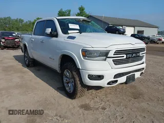 2022 Ram 1500 Laramie with VIN 1C6SRFJT1NN108929, listed as a IAAI auction lot 42358714 with 62,901 mi miles and . Bid and sale history available at DreamBid. Image 1.