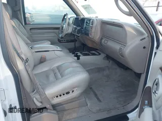 2000 Cadillac Escalade z VIN 1GYEK13R8YR146809, wystawiony jako IAAI lot #41753964 z przebiegiem 156 376 mil mil oraz . Historia ofert i sprzedaży dostępna na DreamBid. Obrazek 5.