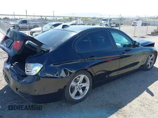 2015 BMW 3 Series 320i with VIN WBA3B1C57FK138441, listed as a IAAI auction lot 42034649 with Not Provided miles. Bid and sale history available at carsss.com. Image 4.