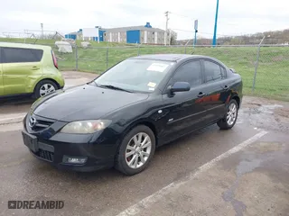 2007 Mazda Mazda3 s Touring with VIN JM1BK323571640804, listed as a IAAI auction lot 41913603 with 134,147 mi miles. Bid and sale history available at carsss.com. Image 2.
