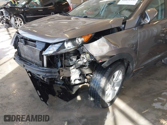2012 Kia Sportage LX with VIN KNDPB3A23C7317650, listed as a IAAI auction lot 41631193 with 96,433 mi miles. Bid and sale history available at carsss.com. Image 6.