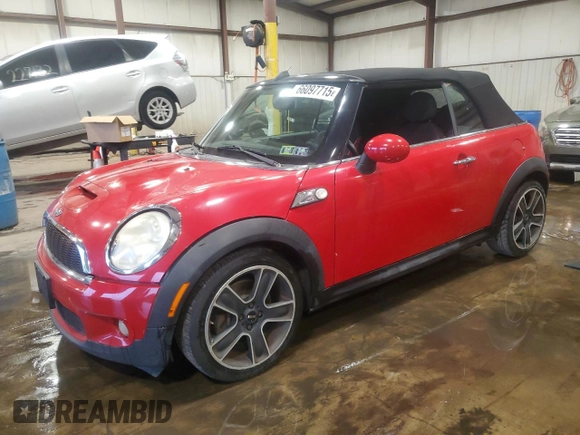 2010 MINI Convertible S with VIN WMWMS3C50ATY51636, listed as a Copart auction lot 66097715 with 103,525 mi miles and Salvage title. Bid and sale history available at DreamBid. Image 1.