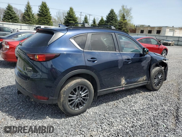 2021 Mazda CX-5 Touring with VIN JM3KFBCM0M0302015, listed as a Copart auction lot 55077305 with 40,558 mi miles and Salvage Title. Bid and sale history available at carsss.com. Image 3.