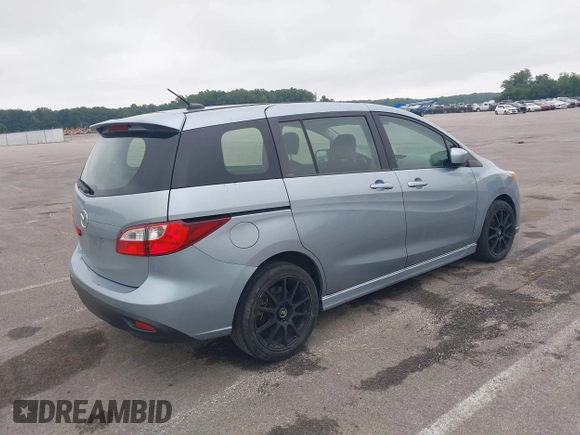 2012 Mazda 5 Touring with VIN JM1CW2CL7C0115096, listed as a IAAI auction lot 42524956 with 173,155 mi miles and . Bid and sale history available at DreamBid. Image 4.