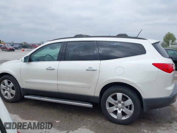 2012 Chevrolet Traverse LTZ z VIN 1GNKRLED1CJ115529, wystawiony jako IAAI lot #41985127 z przebiegiem 85 364 mil mil oraz . Historia ofert i sprzedaży dostępna na DreamBid. Obrazek 14.