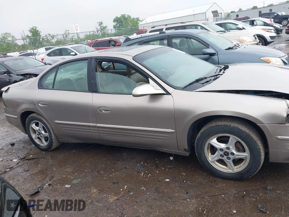 2001 Pontiac Bonneville SE z VIN 1G2HX54K814258899, wystawiony jako IAAI lot #42260783 z przebiegiem 165 869 mil mil oraz . Historia ofert i sprzedaży dostępna na DreamBid. Obrazek 13.
