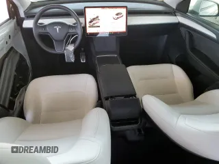 2023 Tesla Model Y Long Range with VIN 7SAYGDEE8PF620703, listed as a Copart auction lot 54655105 with 29,538 mi miles and Salvage Title. Bid and sale history available at DreamBid. Image 8.