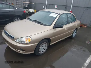 2002 Kia Rio with VIN KNADC123626192611, listed as a IAAI auction lot 41765104 with 62,387 mi miles. Bid and sale history available at carsss.com. Image 2.