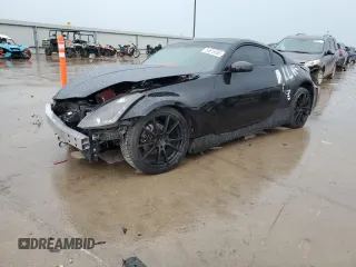 2003 Nissan 350Z Touring z VIN JN1AZ34EX3T012034, wystawiony jako Copart lot #55815265 z przebiegiem Nie podano mil oraz Szkoda całkowita • Salvage title. Historia ofert i sprzedaży dostępna na DreamBid. Obrazek 1.