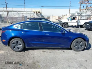 2019 Tesla Model 3 Mid Range with VIN 5YJ3E1EA8KF436086, listed as a IAAI auction lot 41682093 with 70,332 mi miles and . Bid and sale history available at DreamBid. Image 13.