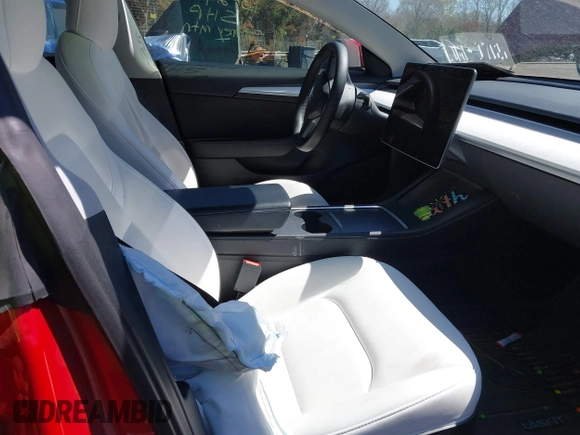 2022 Tesla Model 3 Long Range with VIN 5YJ3E1EB1NF272452, listed as a IAAI auction lot 41897358 with 78,458 mi miles and . Bid and sale history available at DreamBid. Image 5.