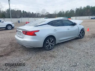 2016 Nissan Maxima SV with VIN 1N4AA6AP7GC439288, listed as a IAAI auction lot 41572262 with 223,185 mi miles and . Bid and sale history available at carsss.com. Image 4.