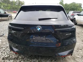 2024 BMW iX xDrive50 with VIN WB523CF09RCP70617, listed as a Copart auction lot 58091014 with 2,539 mi miles and Salvage Title. Bid and sale history available at carsss.com. Image 6.