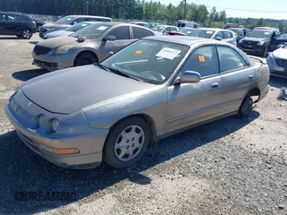 1996 Acura Integra LS z VIN JH4DB7658TS000018, wystawiony jako IAAI lot #42466253 z przebiegiem 191 795 mil mil oraz . Historia ofert i sprzedaży dostępna na DreamBid. Obrazek 2.