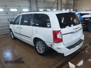 2015 Chrysler Town & Country Touring-L with VIN 2C4RC1CG9FR573653, listed as a IAAI auction lot 41839012 with 116,248 mi miles. Bid and sale history available at carsss.com. Image 3.
