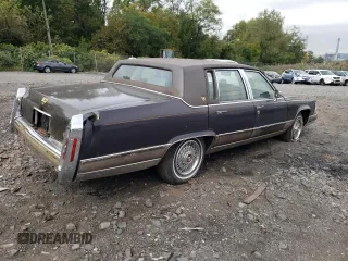 1991 Cadillac Brougham z VIN 1G6DW54EXMR701457, wystawiony jako Copart lot #70194104 z przebiegiem Nie podano mil oraz Nie do naprawy. Historia ofert i sprzedaży dostępna na DreamBid. Obrazek 3.