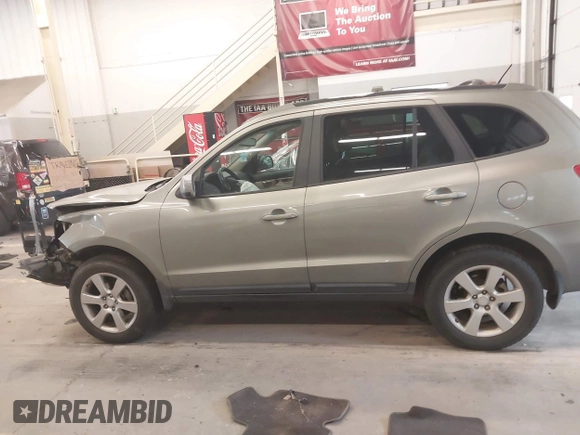 2009 Hyundai Santa Fe SE with VIN 5NMSH73EX9H233513, listed as a IAAI auction lot 42272756 with 155,262 mi miles and . Bid and sale history available at DreamBid. Image 14.
