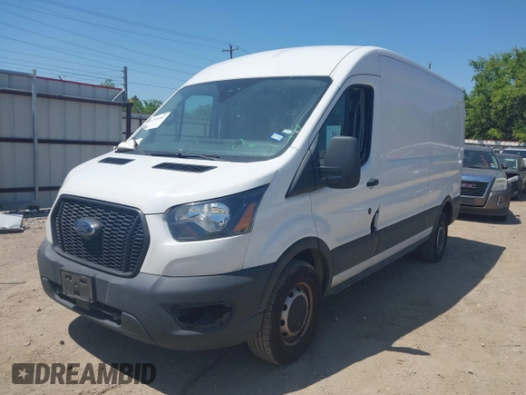 2021 Ford Transit Cargo with VIN 1FTBR1C8XMKA64837, listed as a IAAI auction lot 42008582 with 74,562 mi miles and . Bid and sale history available at DreamBid. Image 2.