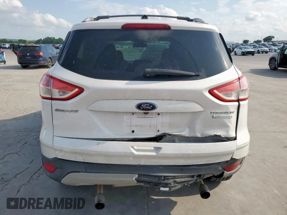 2013 Ford Escape Titanium z VIN 1FMCU0J90DUC13426, wystawiony jako Copart lot #53643565 z przebiegiem 176 600 mil mil oraz Szkoda całkowita • Salvage title. Historia ofert i sprzedaży dostępna na DreamBid. Obrazek 6.