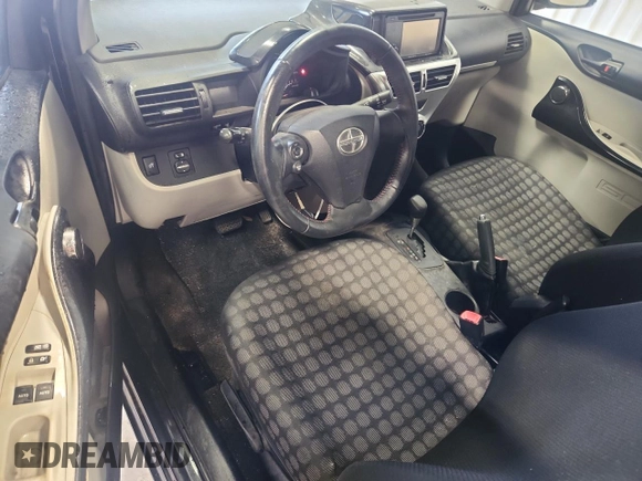 2012 Scion iQ z VIN JTNJJXB04CJ012587, wystawiony jako Copart lot #58191845 z przebiegiem 104 601 mil mil oraz Szkoda całkowita • Salvage title. Historia ofert i sprzedaży dostępna na DreamBid. Obrazek 8.