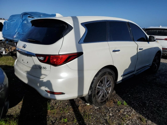 2019 Infiniti QX60 Pure z VIN 5N1DL0MN6KC503270, wystawiony jako Copart lot #75296514 z przebiegiem Nie podano mil oraz Szkoda całkowita • Salvage title. Historia ofert i sprzedaży dostępna na DreamBid. Obrazek 3.