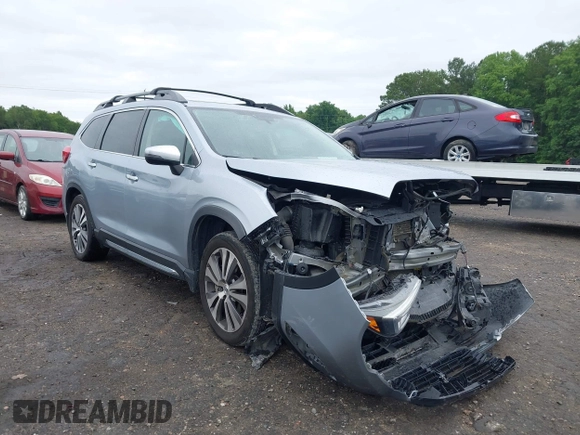 2021 Subaru Ascent Touring with VIN 4S4WMARD3M3465396, listed as a IAAI auction lot 42354850 with 94,783 mi miles and . Bid and sale history available at DreamBid. Image 1.