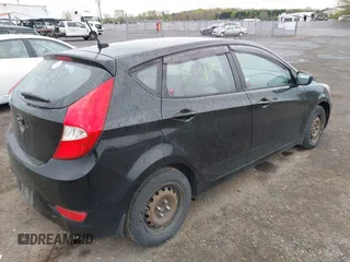 2016 Hyundai Accent SE with VIN KMHCT5AE6GU290609, listed as a IAAI auction lot 42006125 with 156,208 mi miles. Bid and sale history available at carsss.com. Image 4.