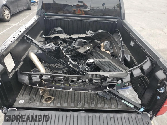 2025 Toyota Tacoma SR with VIN 3TMLB5JN4SM104263, listed as a Copart auction lot 54402775 with 1,010 mi miles and Salvage Title. Bid and sale history available at DreamBid. Image 12.