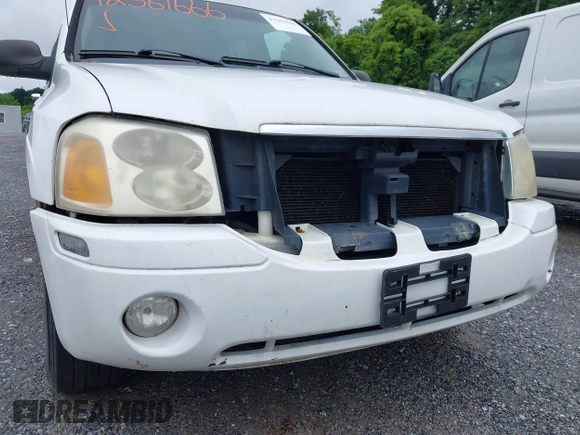 2006 GMC Envoy SLE z VIN 1GKDT13S562116159, wystawiony jako IAAI lot #42361666 z przebiegiem 243 466 mil mil oraz . Historia ofert i sprzedaży dostępna na DreamBid. Obrazek 15.