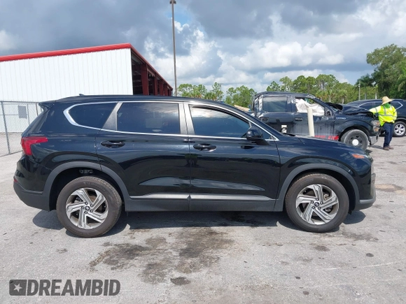 2021 Hyundai Santa Fe SE z VIN 5NMS14AJ0MH332918, wystawiony jako IAAI lot #42365534 z przebiegiem 58 720 mil mil oraz . Historia ofert i sprzedaży dostępna na DreamBid. Obrazek 13.