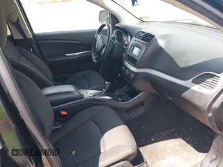 2017 Dodge Journey SXT z VIN 3C4PDDBG8HT512575, wystawiony jako IAAI lot #39710775 z przebiegiem 132 987 mil mil oraz . Historia ofert i sprzedaży dostępna na DreamBid. Obrazek 5.