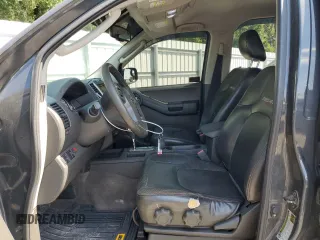 2011 Nissan Xterra S with VIN 5N1AN0NW5BC511218, listed as a Copart auction lot 61609915 with 207,550 mi miles and Salvage title. Bid and sale history available at DreamBid. Image 7.