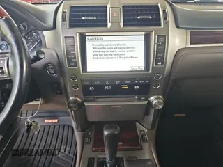 2012 Lexus GX 460 z VIN JTJBM7FX5C5040119, wystawiony jako Copart lot #59240765 z przebiegiem 165 878 mil mil oraz Tytuł czysty. Historia ofert i sprzedaży dostępna na DreamBid. Obrazek 9.
