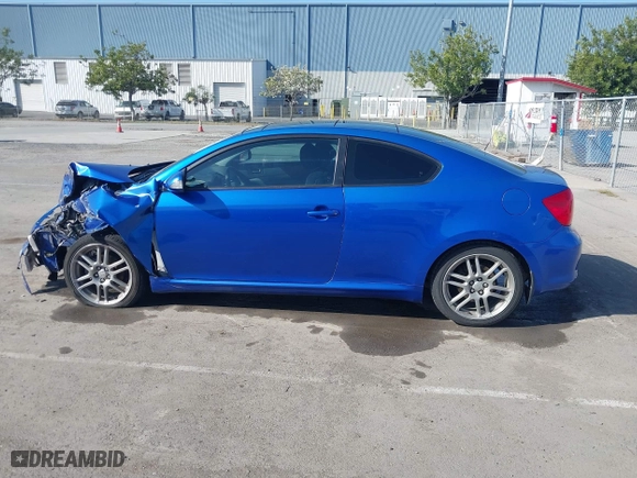 2006 Scion tC with VIN JTKDE167560136252, listed as a IAAI auction lot 42000724 with 168,727 mi miles. Bid and sale history available at carsss.com. Image 14.