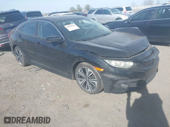 2016 Honda Civic EX-T z VIN 2HGFC1F3XGH630558, wystawiony jako IAAI lot #41868334 z przebiegiem 154 452 mil mil oraz . Historia ofert i sprzedaży dostępna na DreamBid. Obrazek 1.