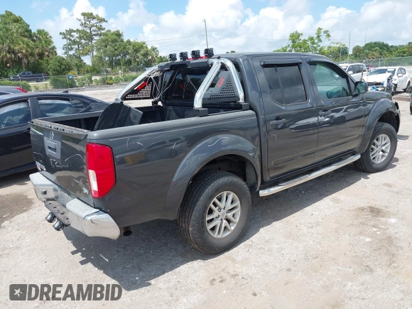 2014 Nissan Frontier SV z VIN 1N6AD0ER9EN751010, wystawiony jako IAAI lot #42326309 z przebiegiem 199 871 mil mil oraz . Historia ofert i sprzedaży dostępna na DreamBid. Obrazek 4.