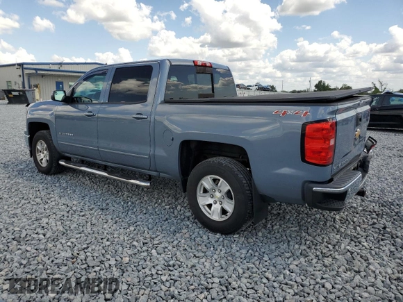 2015 Chevrolet Silverado 1500 LT with VIN 3GCUKREC8FG284565, listed as a Copart auction lot 52760805 with 128,501 mi miles and Salvage Title. Bid and sale history available at DreamBid. Image 2.